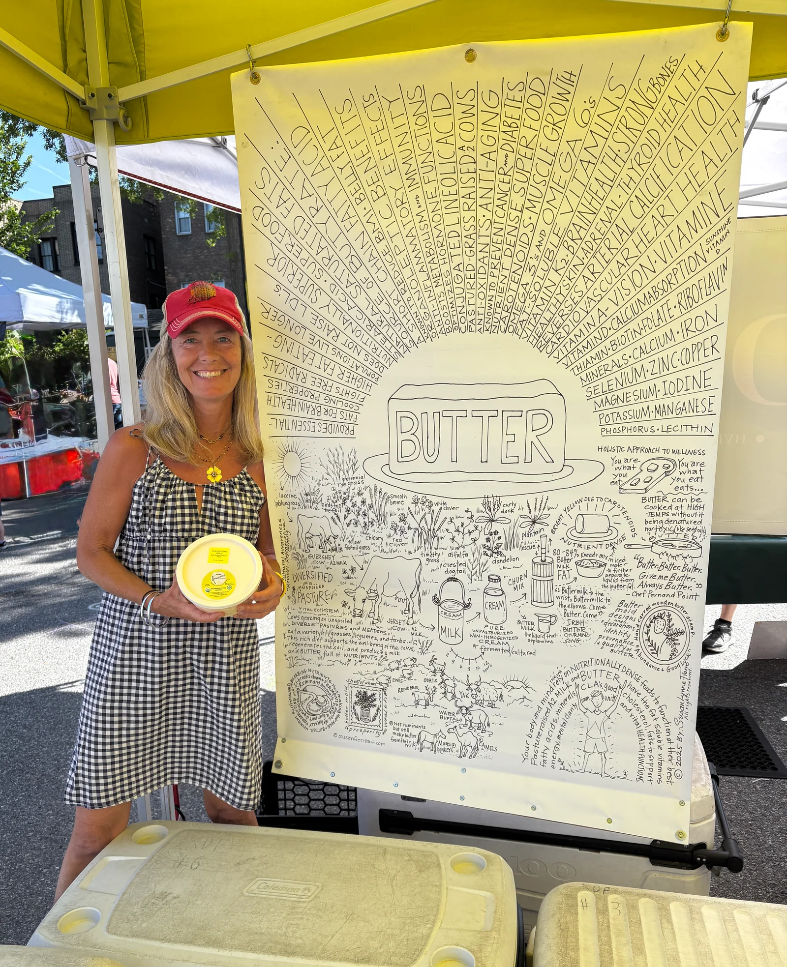 Susan Fierro at the farmer's market with her butter illustration
